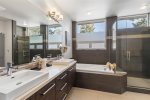 Large bathtub and separate shower, king main